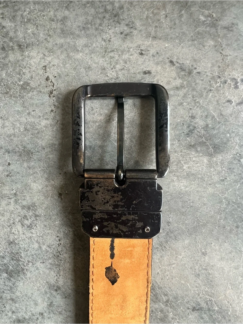 Vintage Levi's black tooled leather western belt with rotating harness buckle